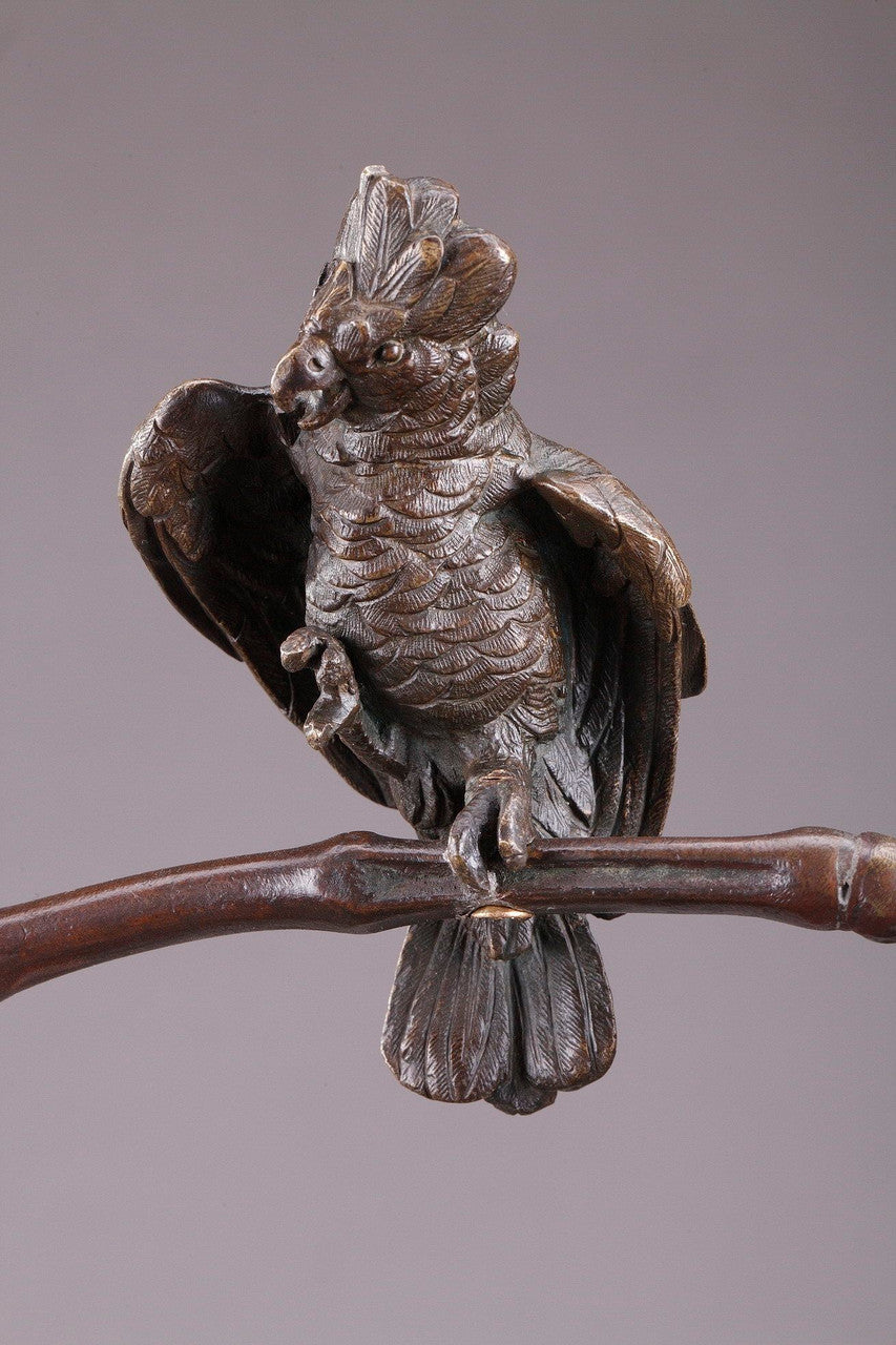 Grande statue en bronze figurant un charmeur d'oiseaux par le sculpteur et médailleur belge Auguste de Wever. Kikooyou Art Gallery